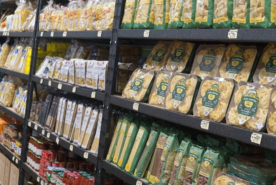 Shelves of pasta in a store. 