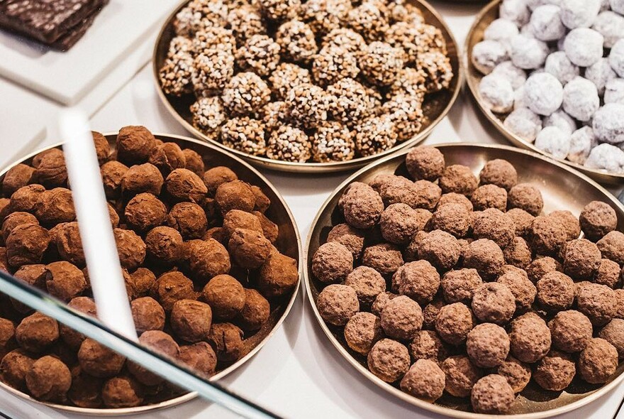 Bowls of chocolate truffles.